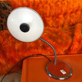 Orange articulated desk lamp
