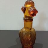 Flacon ancien en verre ambré "caniche"