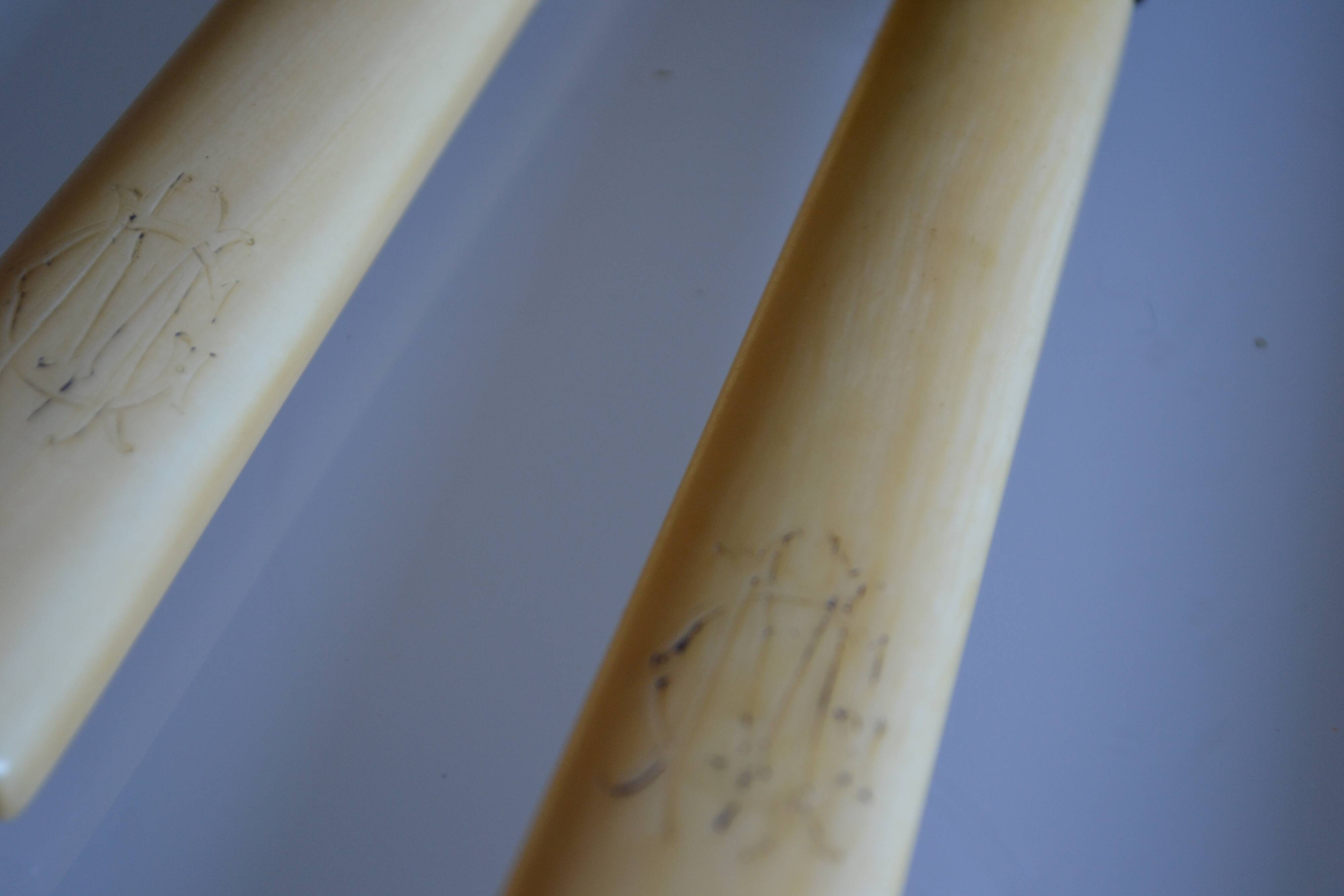 11 antique dessert knives from the 19th century with ivory-colored handles and a monogram