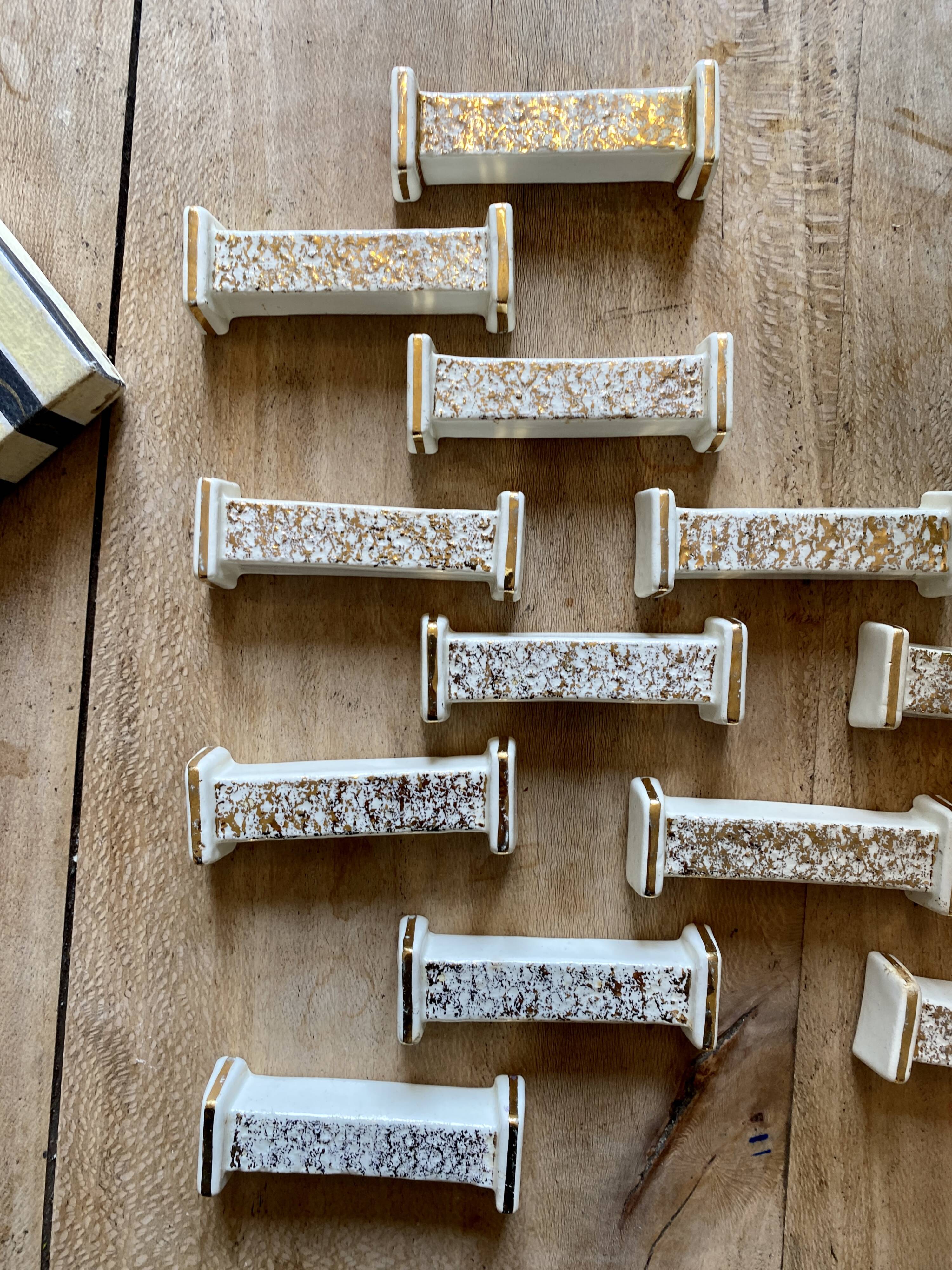 Set of 10 vintage art deco knife holders in white and gold ceramic