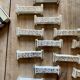 Set of 10 vintage art deco knife holders in white and gold ceramic
