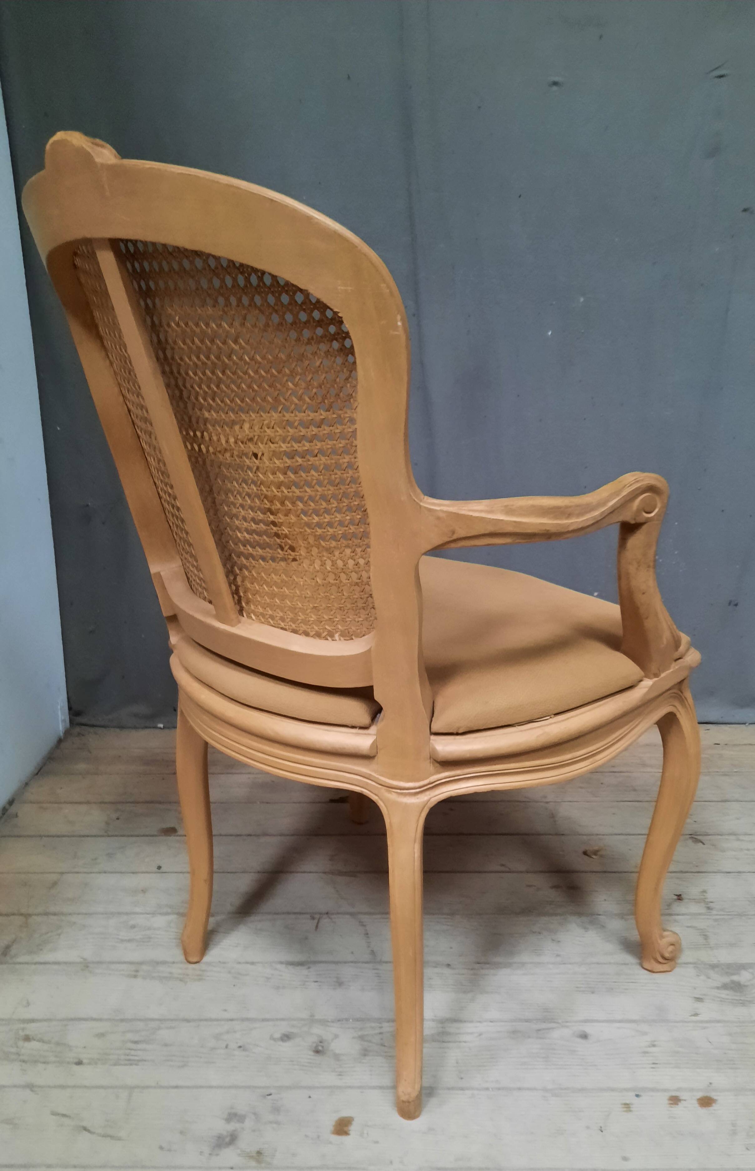 Louis XVI style caned armchair