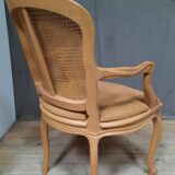 Louis XVI style caned armchair