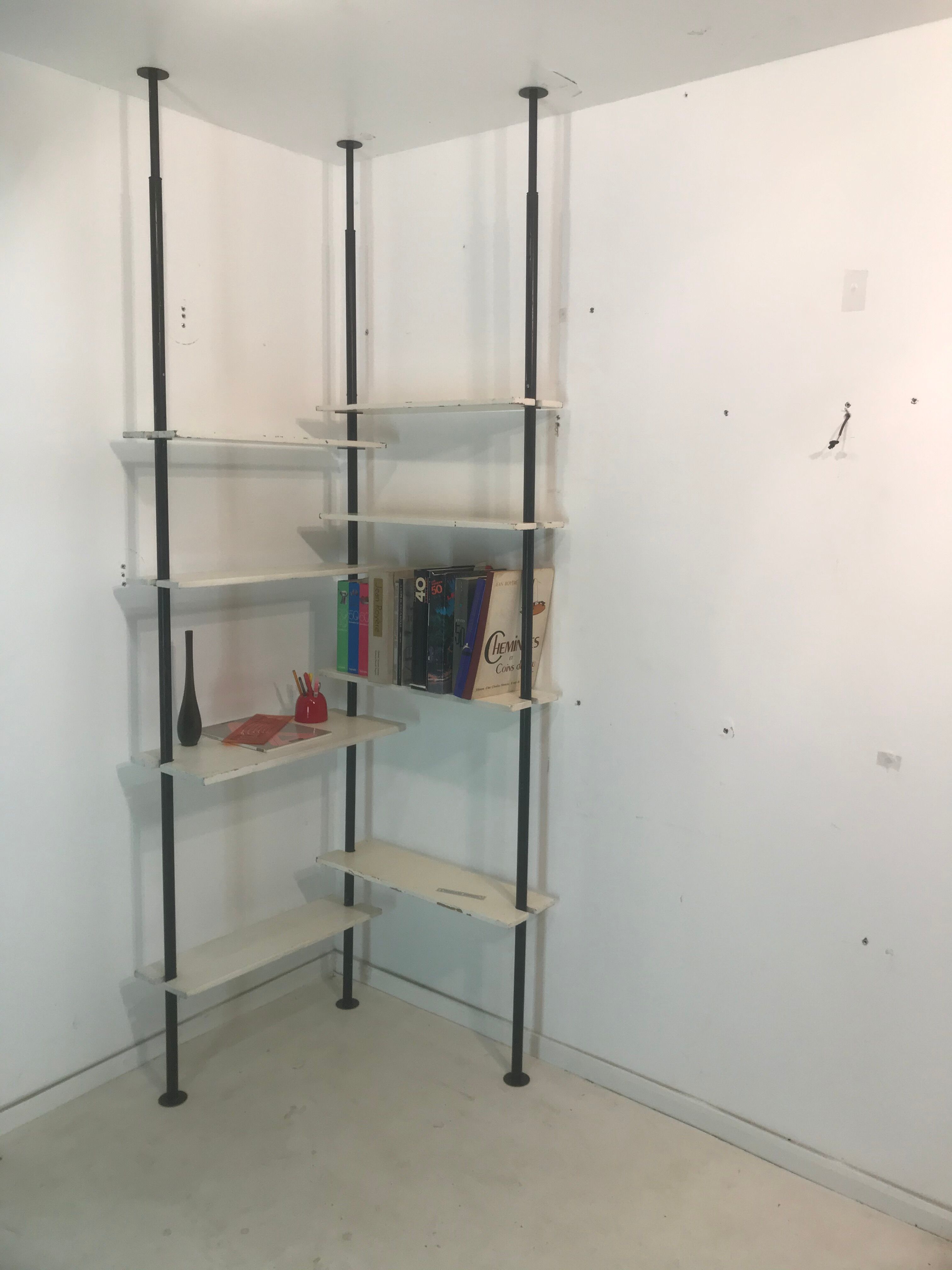 3-mounted floor/ceiling library