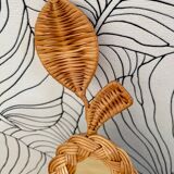 Pear-shaped woven wicker mirror