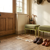 Set of two vintage-style footstools, green wood and bouclé upholstery