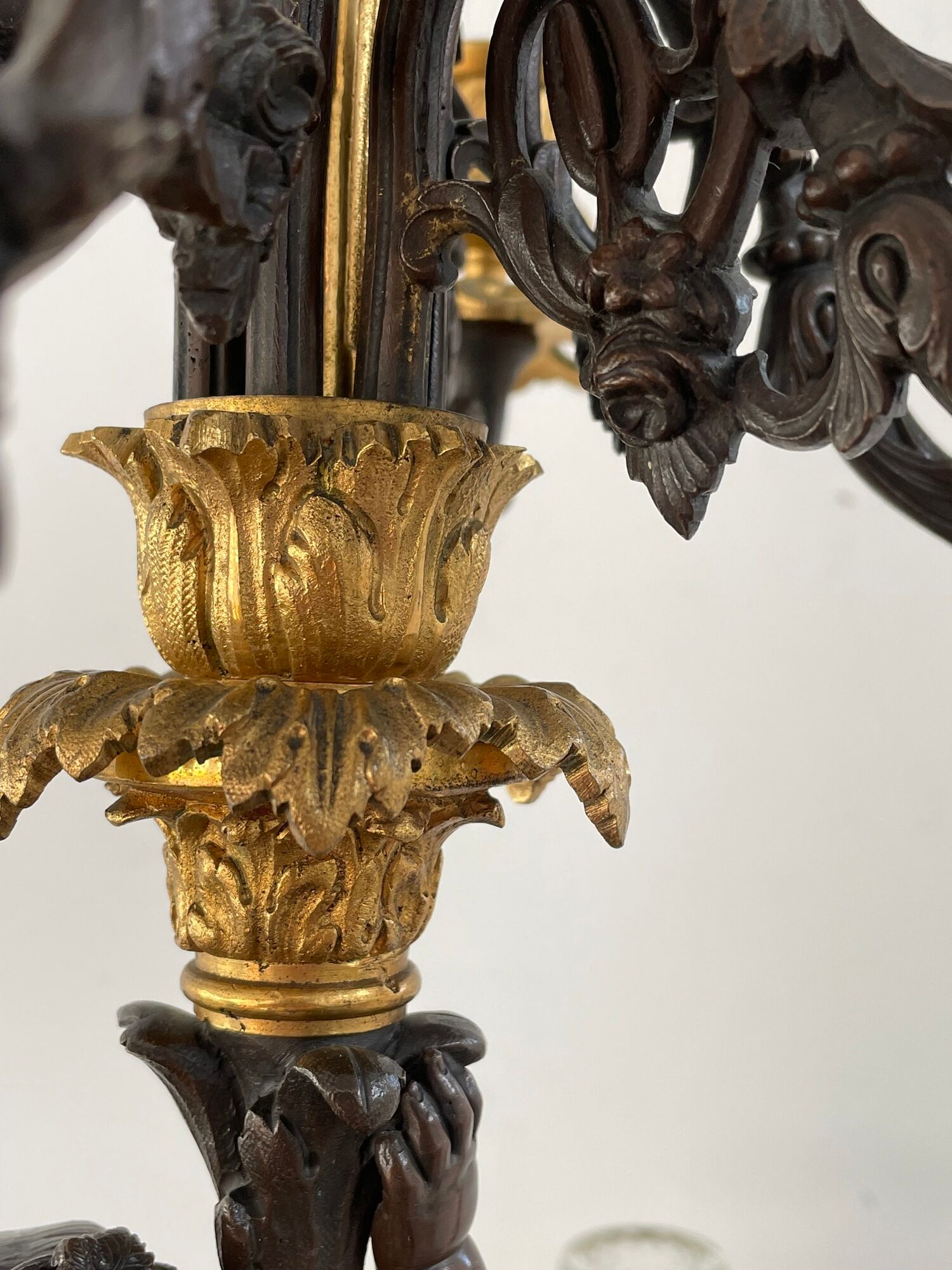 Candelabra with cherub in patinated bronze