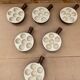 Set of 6 émile henry snail dishes in beige brown ceramic pan