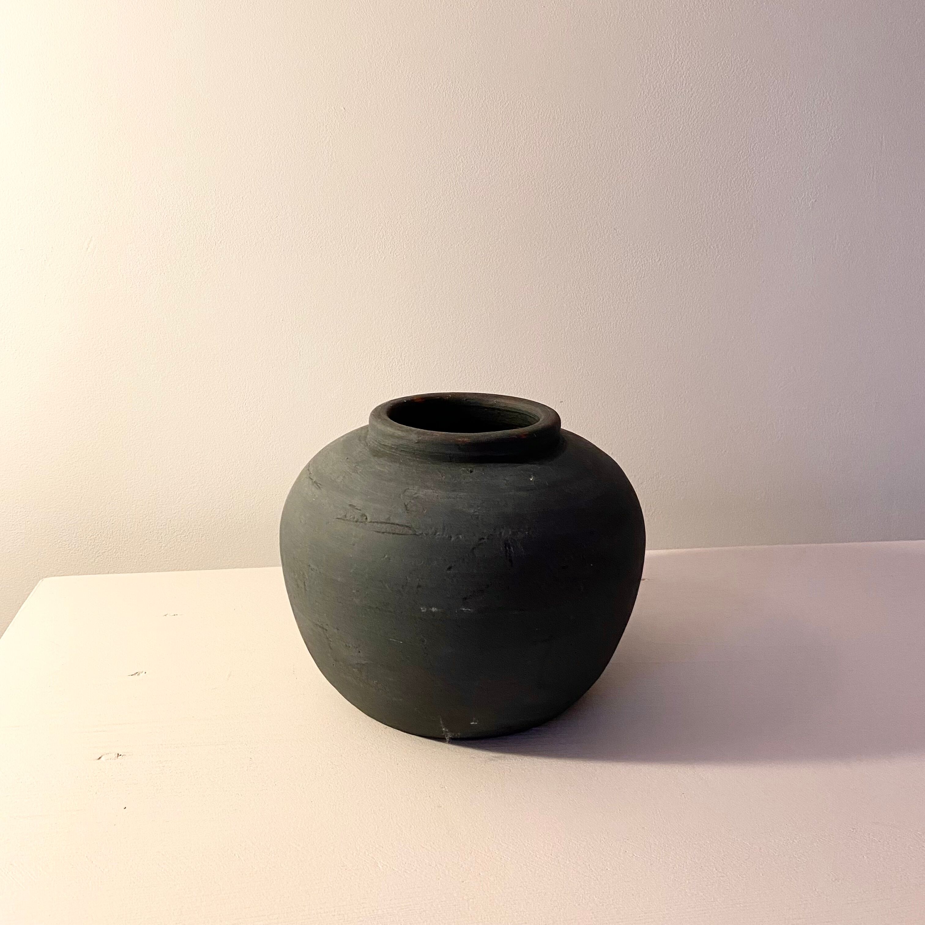 Black patinated terracotta vase