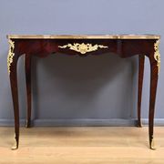 Rosewood, mahogany, and rosewood desk-table, Louis XV style – early 20th century.
