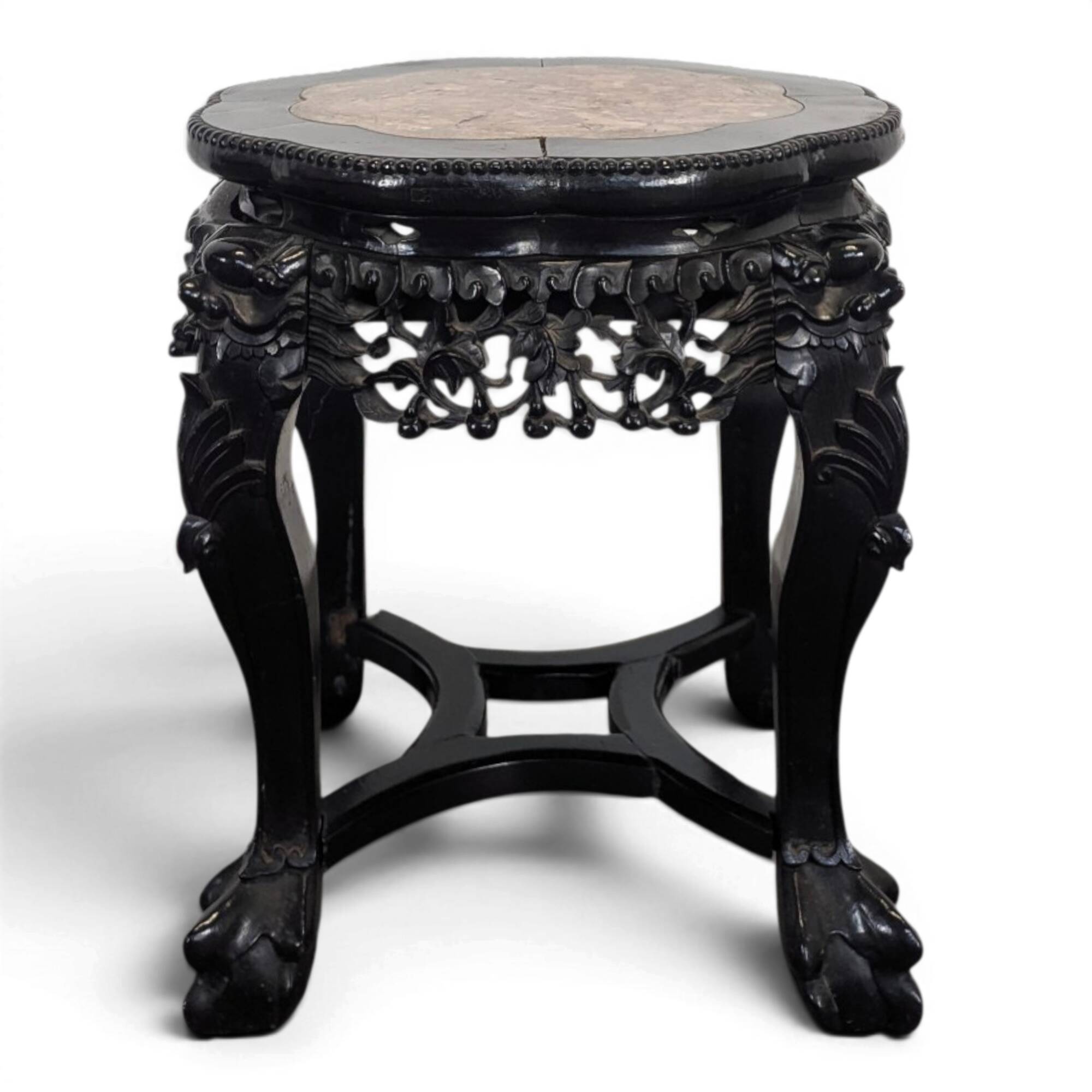 Side table with a wooden frame and marble top.