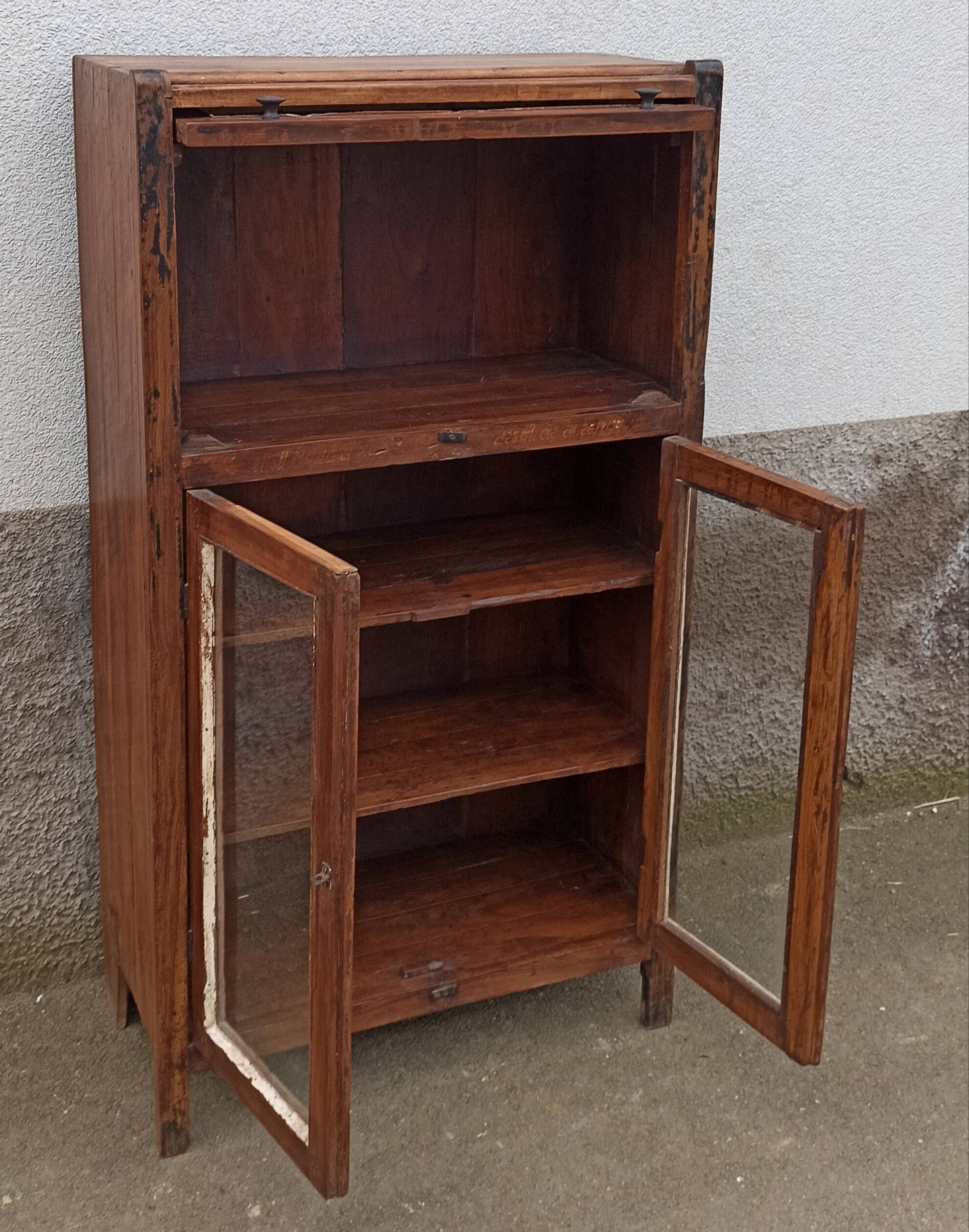 Small wooden glass cabinet with retractable door