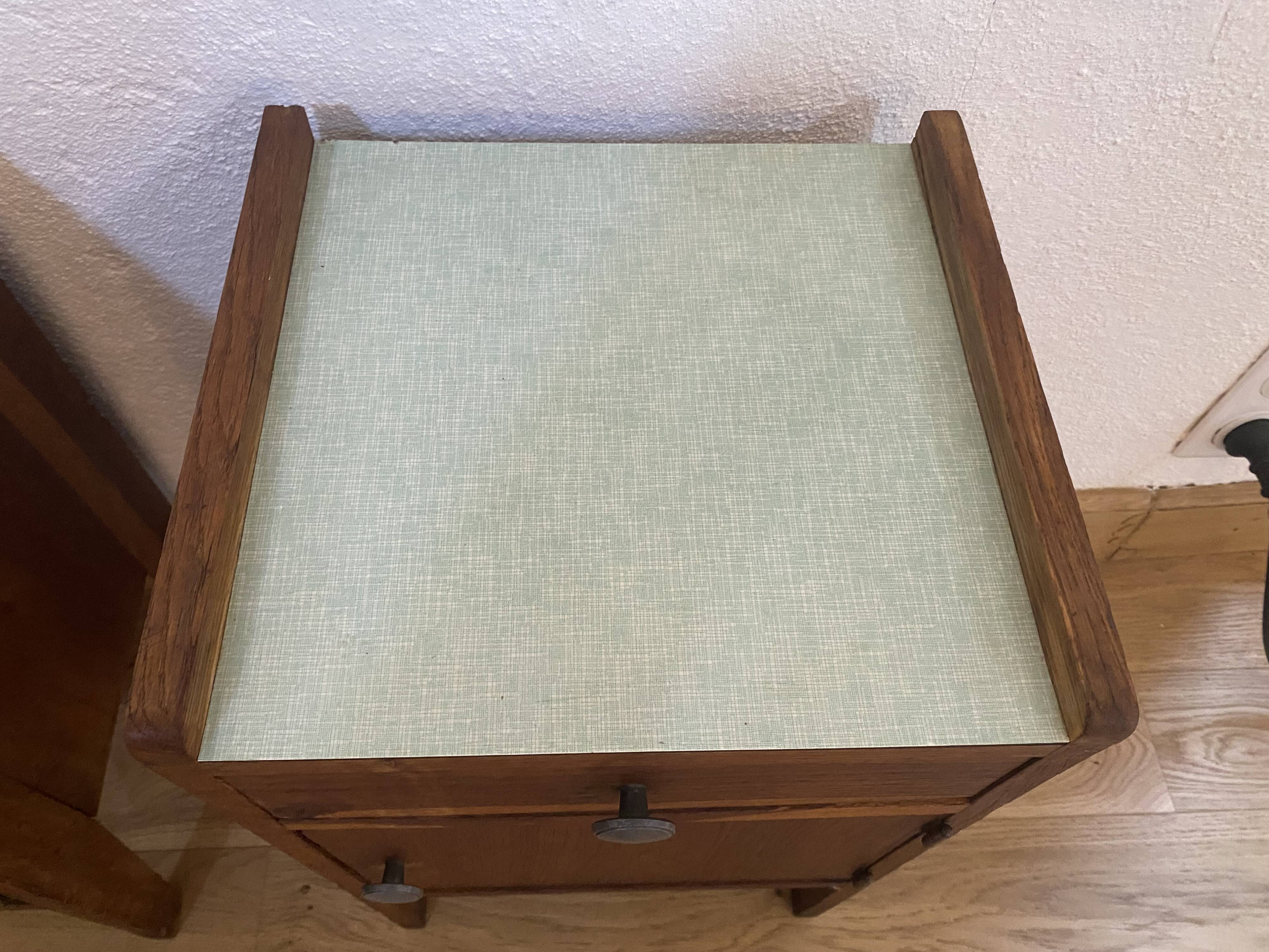Pair of solid oak bedside tables from the 1950s.