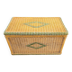 Large vintage wicker chest with green decoration.