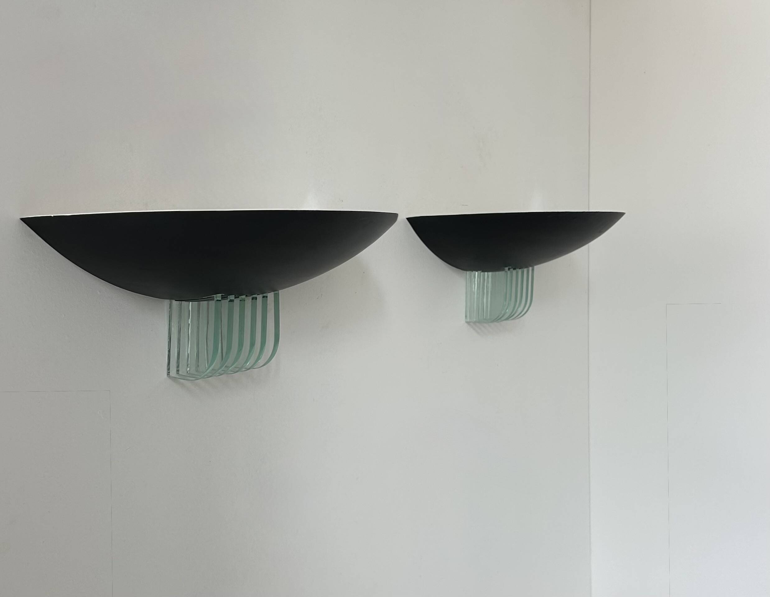 Pair of vintage post-modernist wall lights, black metal and glass, France 1980