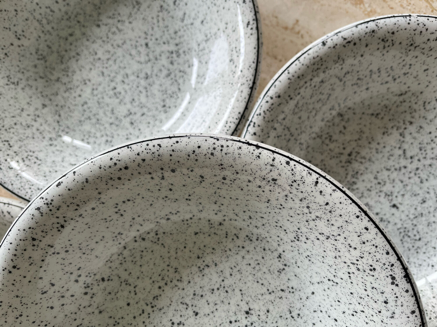 5 hollow plates in hand-speckled Italian ceramic