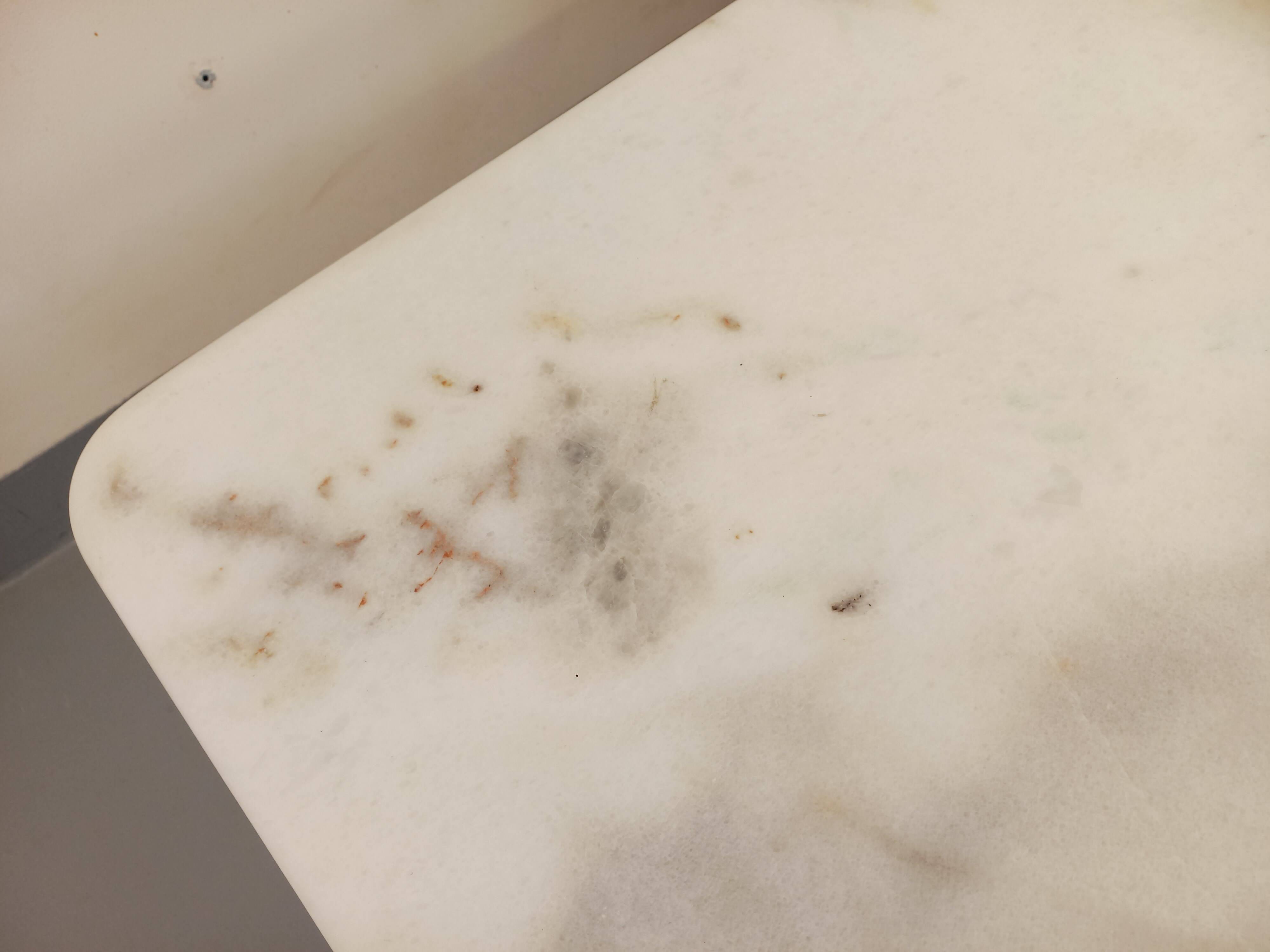 Pair of vintage nesting coffee tables in white marble from the 1970s.