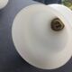 Three large vintage torch wall sconces.