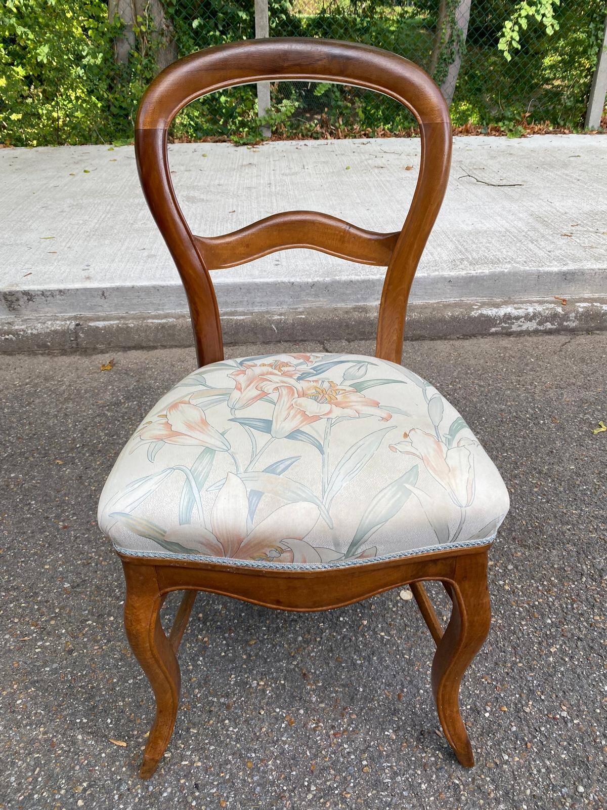 Antique flying chair in Restoration / Louis-Philippe style made of solid wood.
