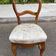 Antique flying chair in Restoration / Louis-Philippe style made of solid wood.