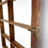 Vintage wooden window converted to a mirror