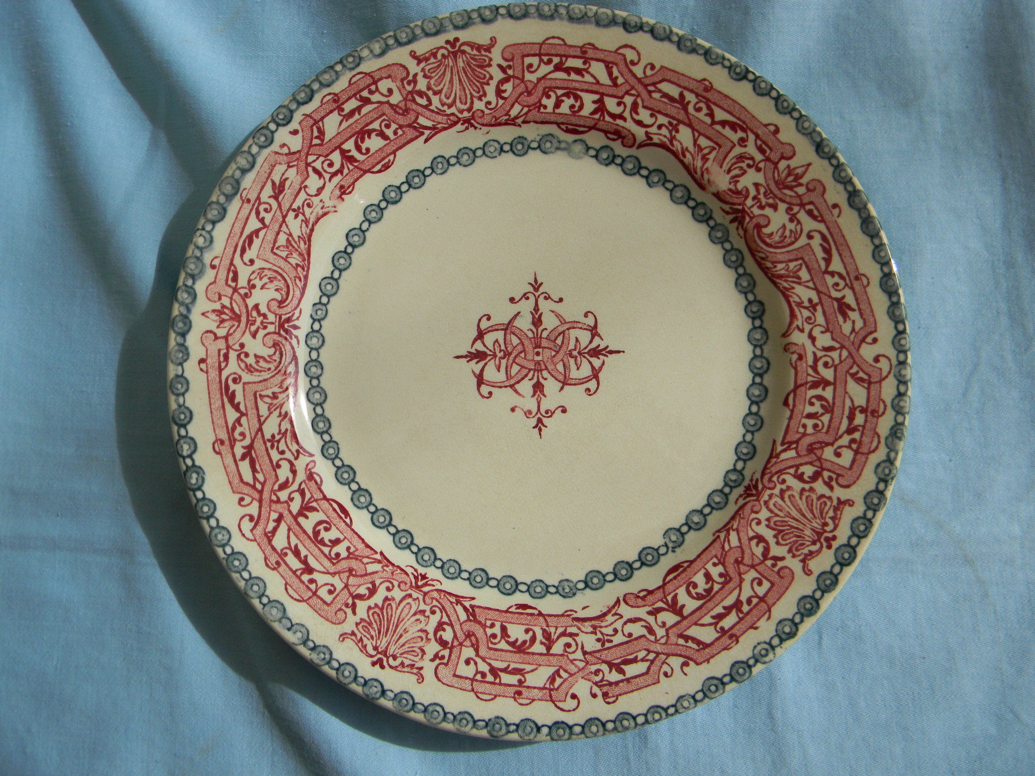 Miscellaneous set of 4 old flat earthenware plates.