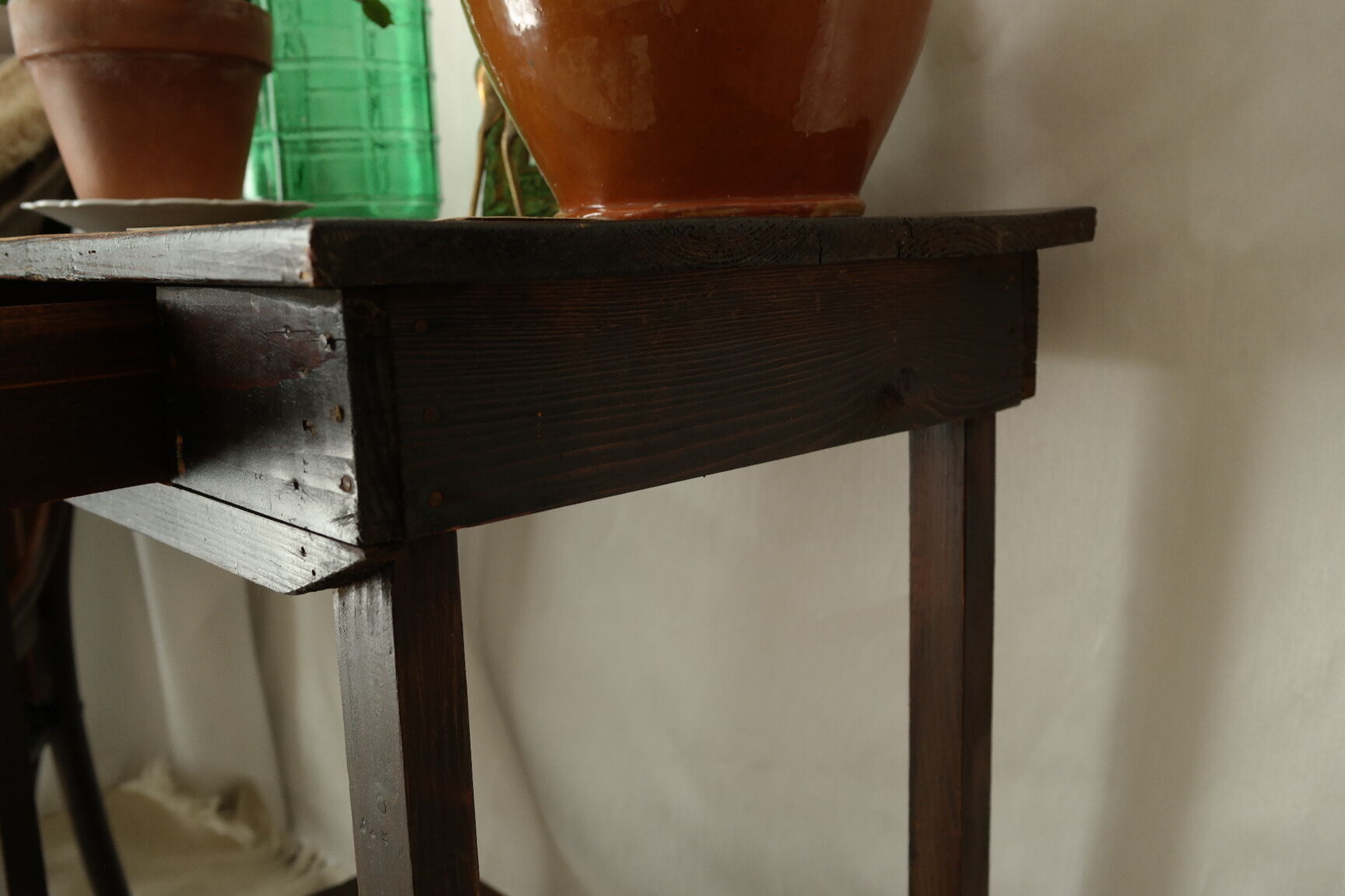 Old country side table in waxed wood