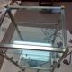 Glass and brass shelf on wheels