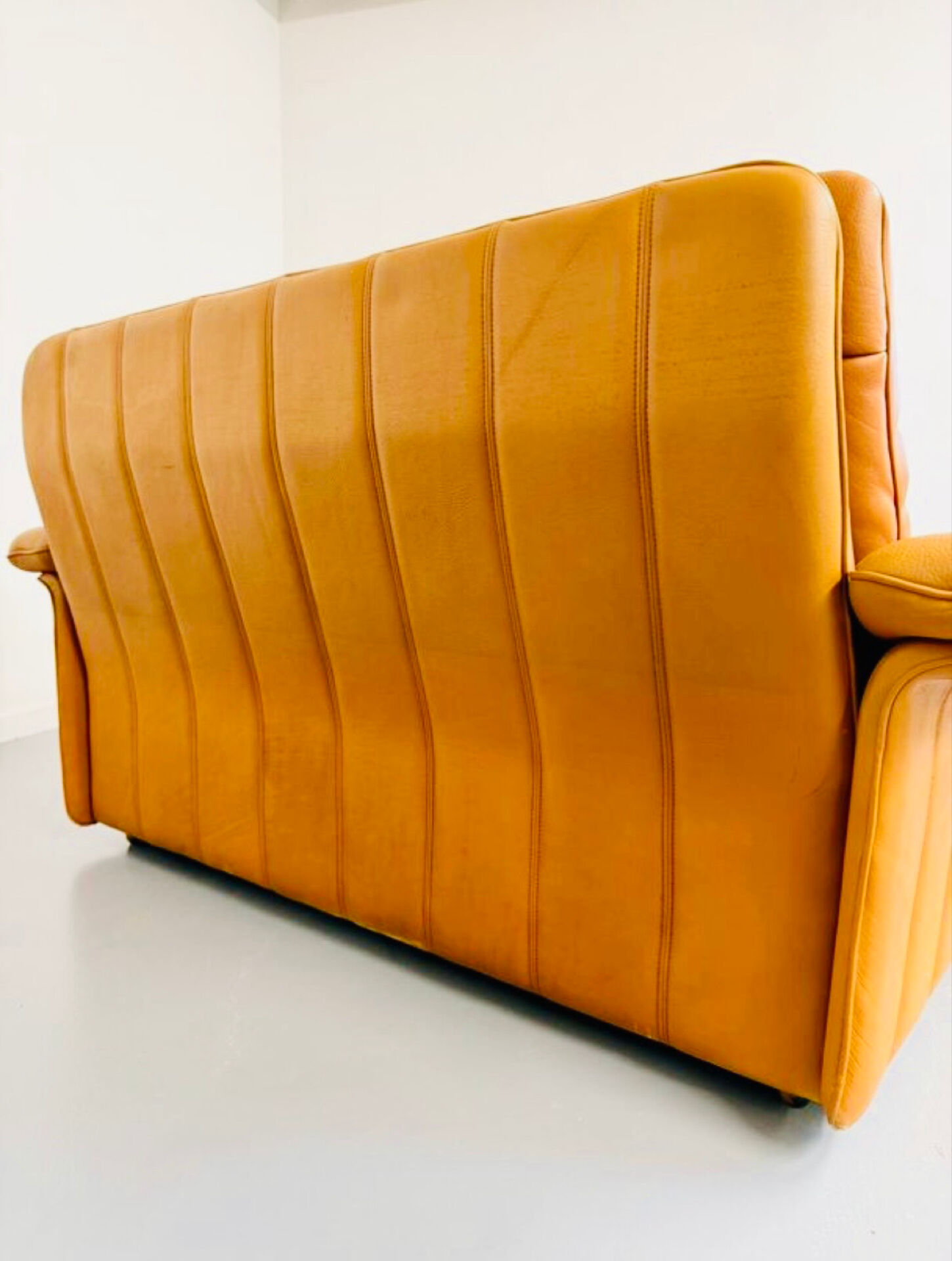 Vintage 70s thick cognac leather 2-seater sofa by De Sede.