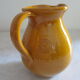 Enamelled earthenware pitcher