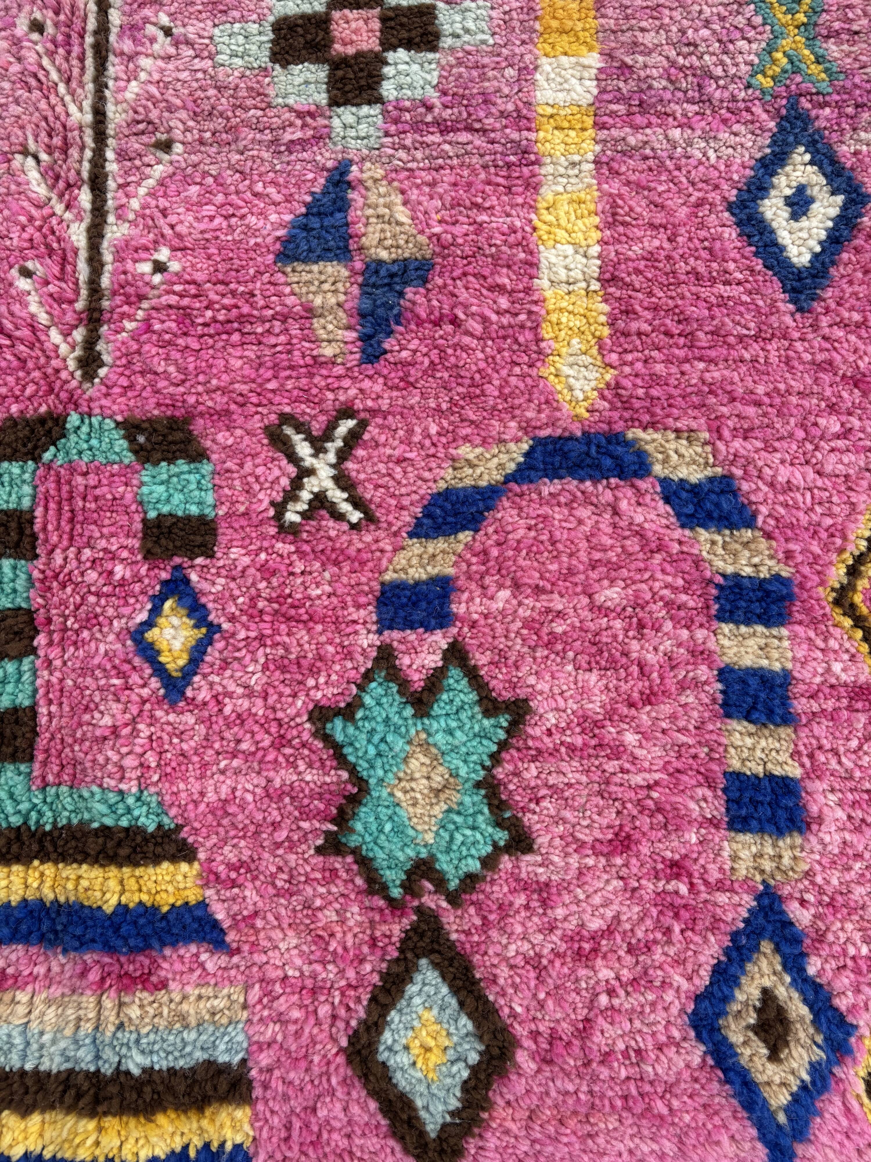 Boho chic Moroccan pink wool rug