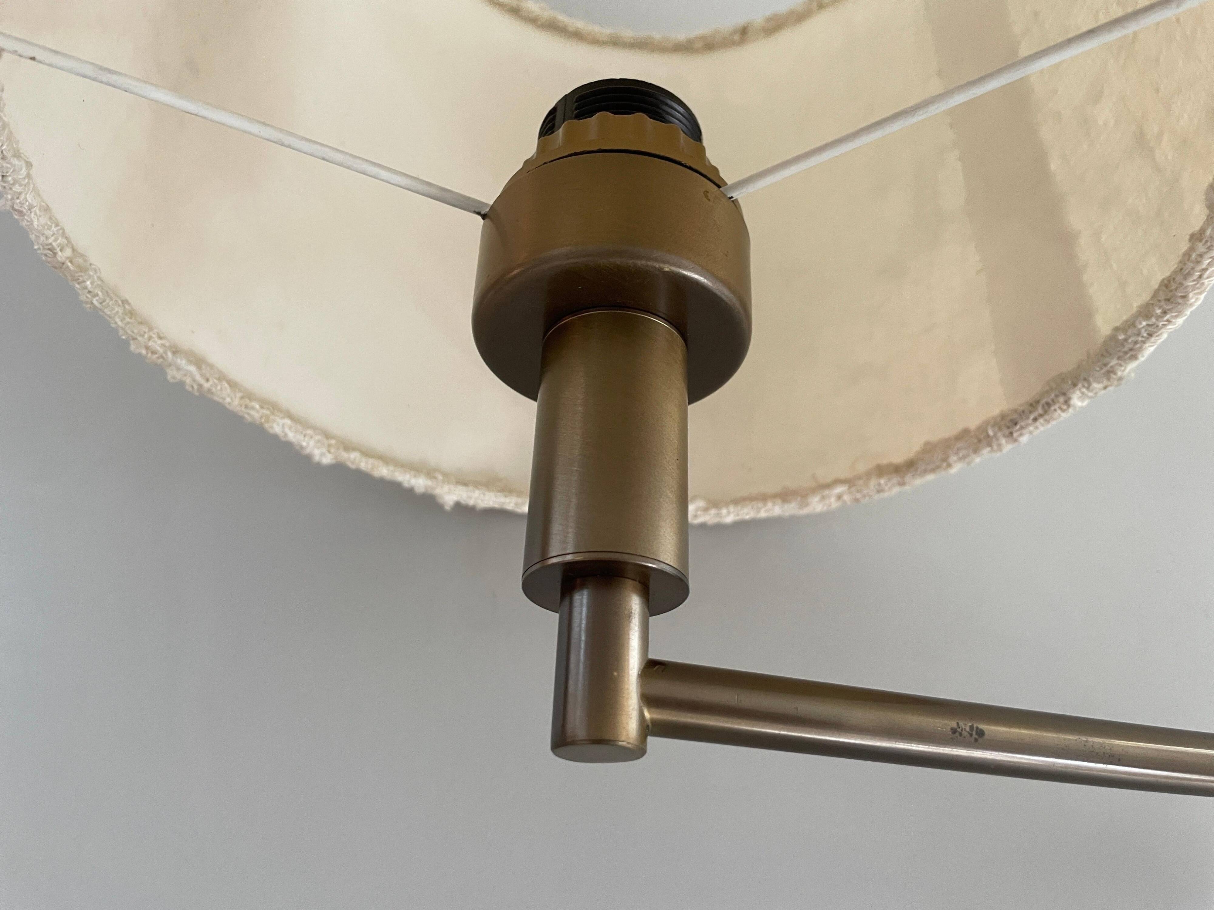 Adjustable brass wall lamp with fabric shade, Danish design, 1970s, Denmark.