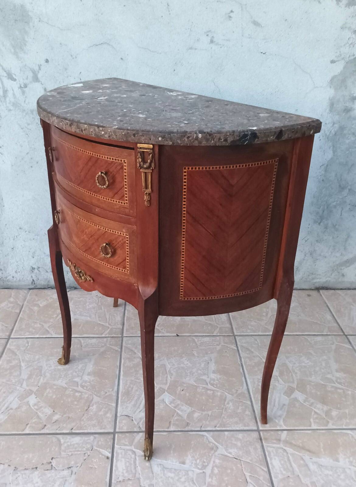 Half-moon commode in Louis XV style with walnut veneer.