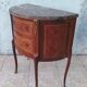 Half-moon commode in Louis XV style with walnut veneer.