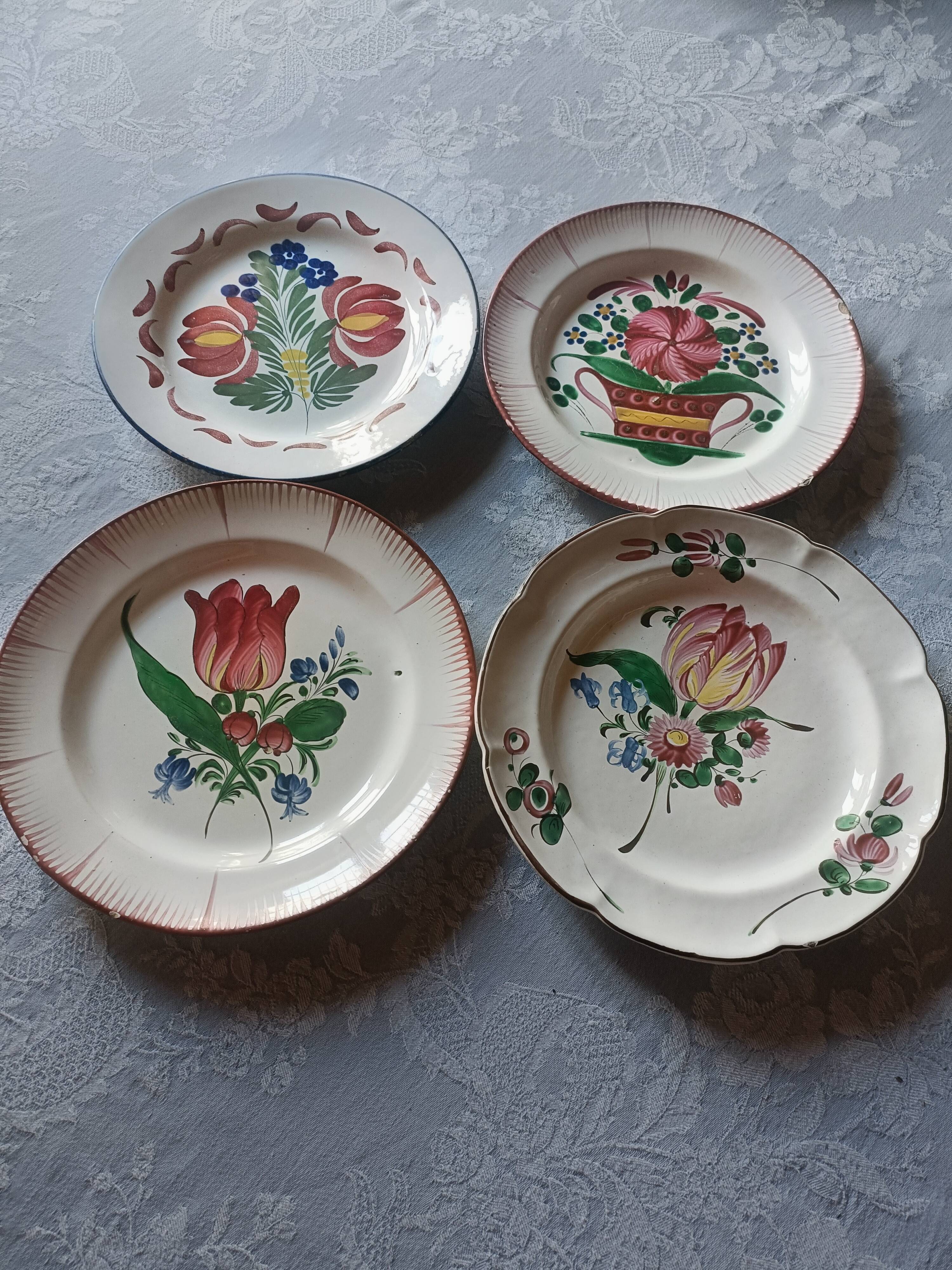 Set of 4 19th-century earthenware plates.