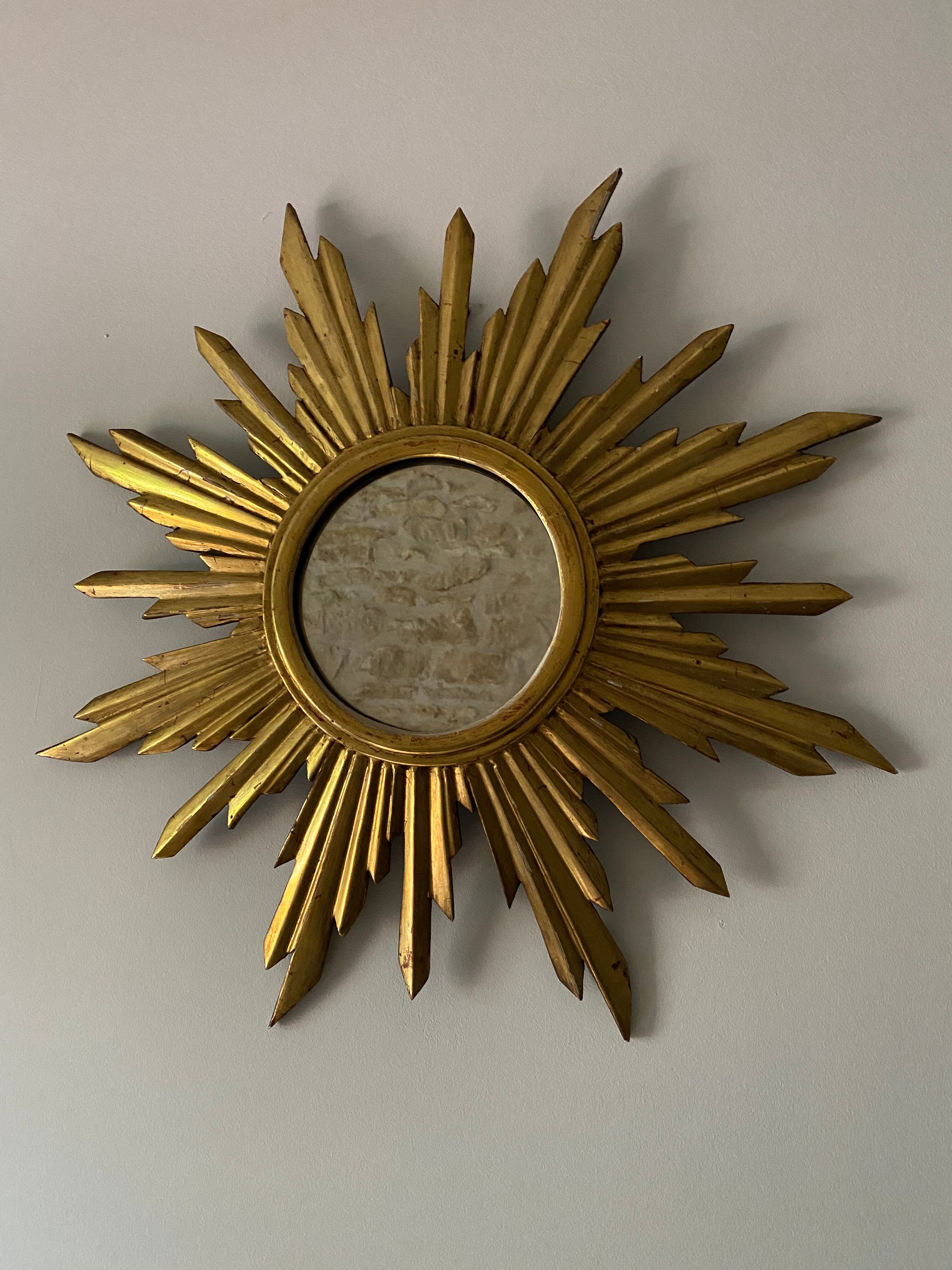 Genuine antique sun mirror