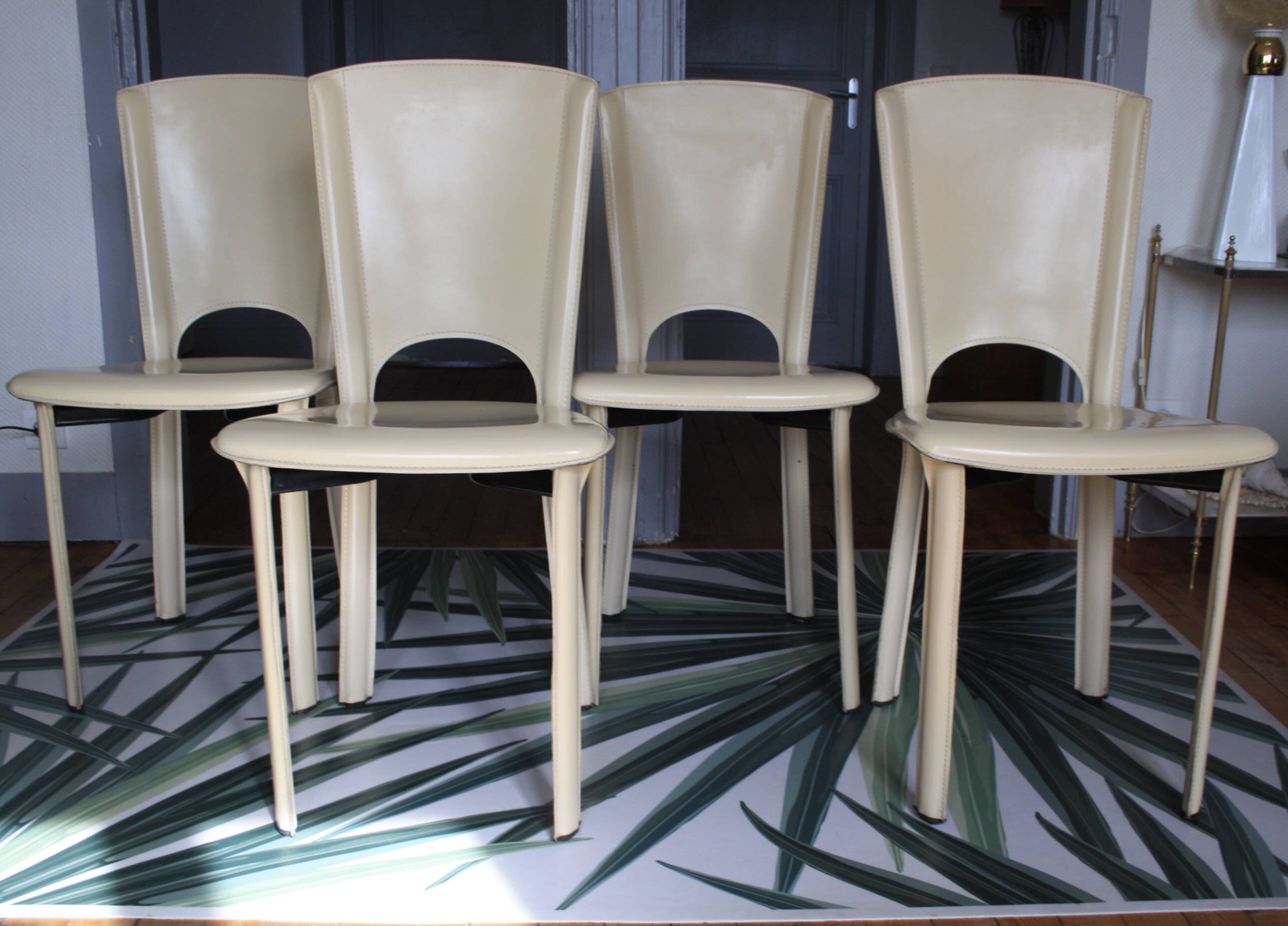 Set of 4 beige leather chairs from the 80s in Italy