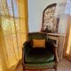 Paire de fauteuils vintage en bois massif et velours vert