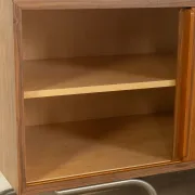Striking mid-century sideboard with stainless steel base