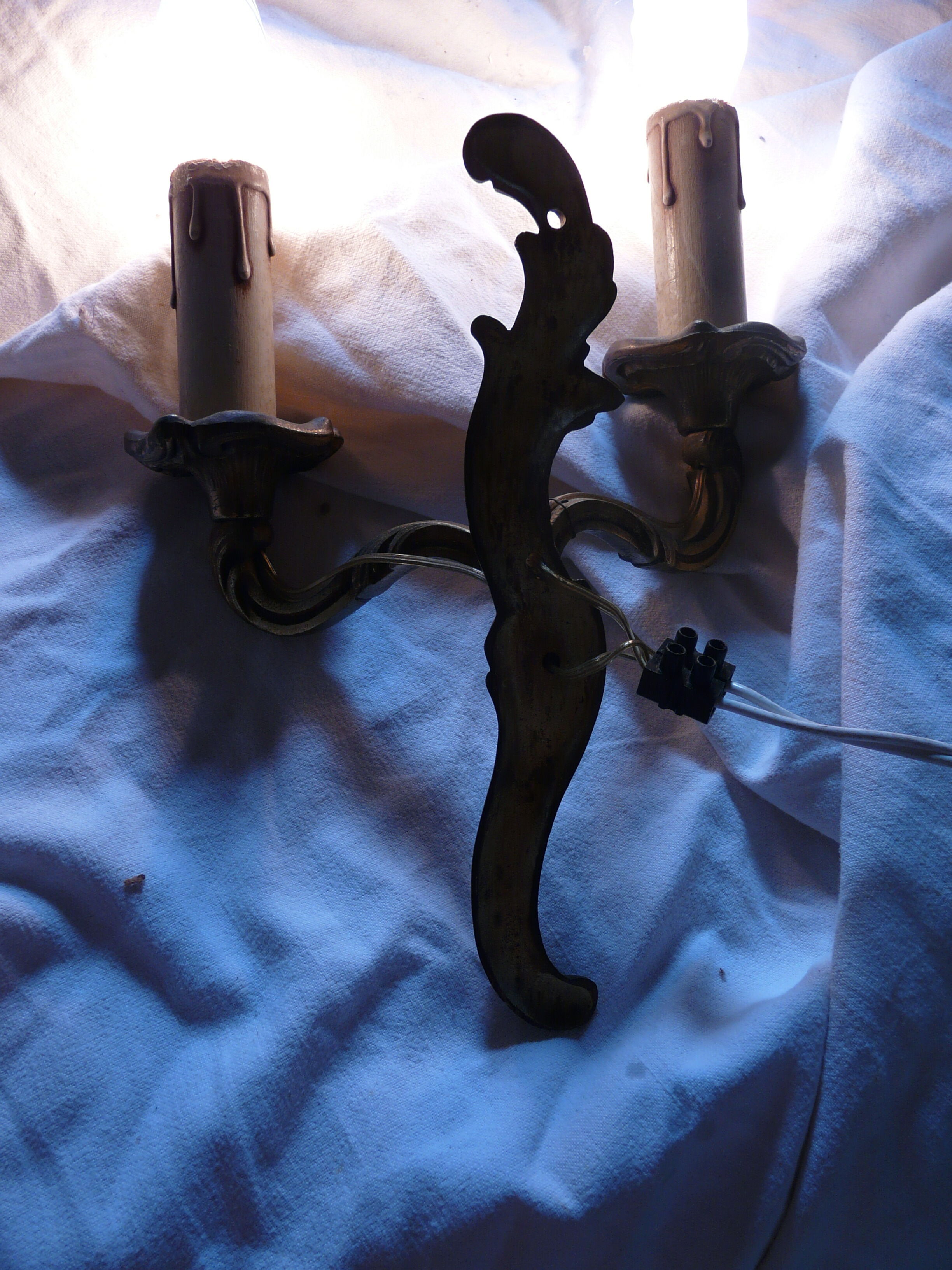 Two pairs of bronze wall lamps