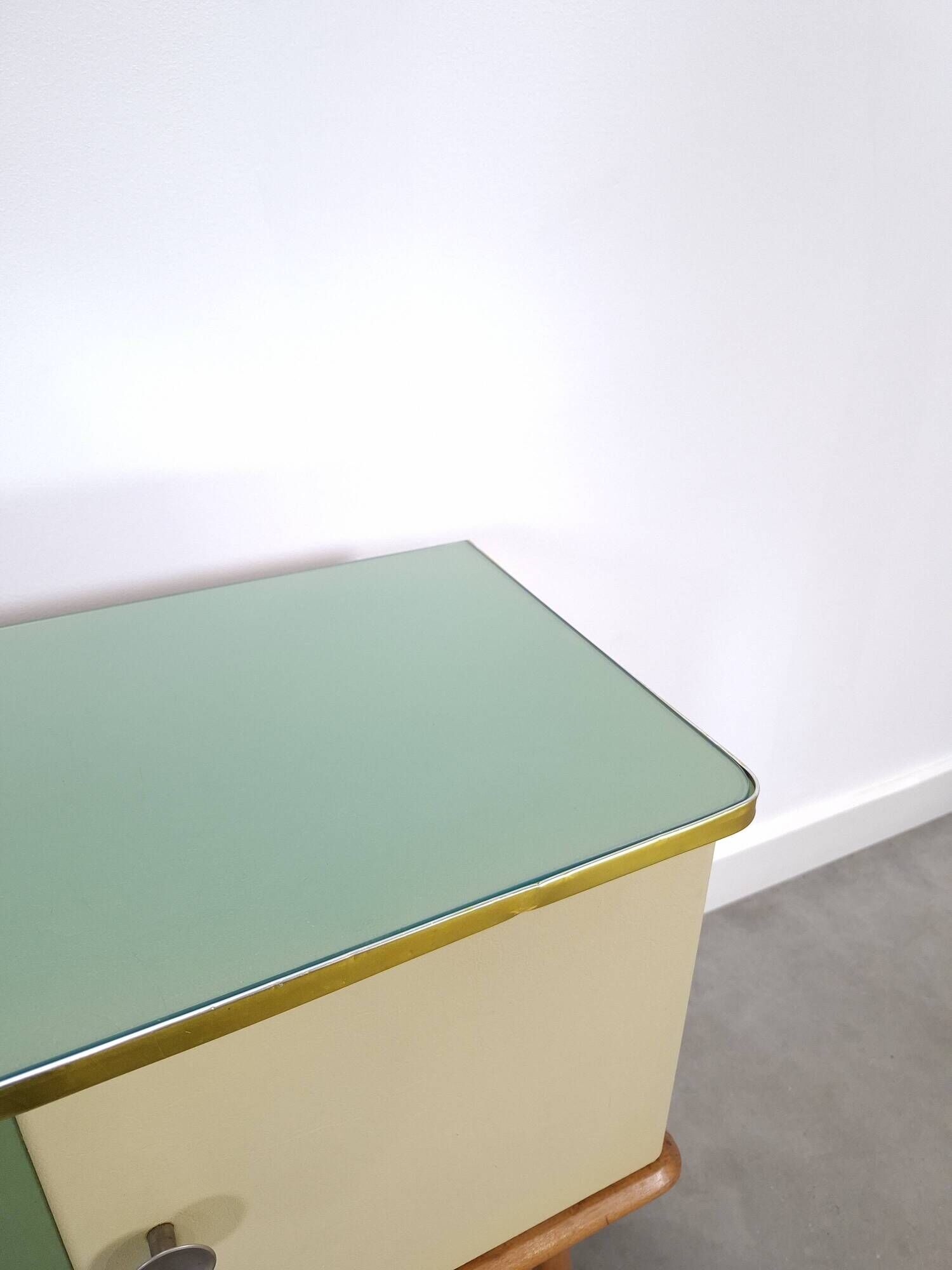 Vintage green DDR cabinet, model Libelle with glass top, slanted legs.