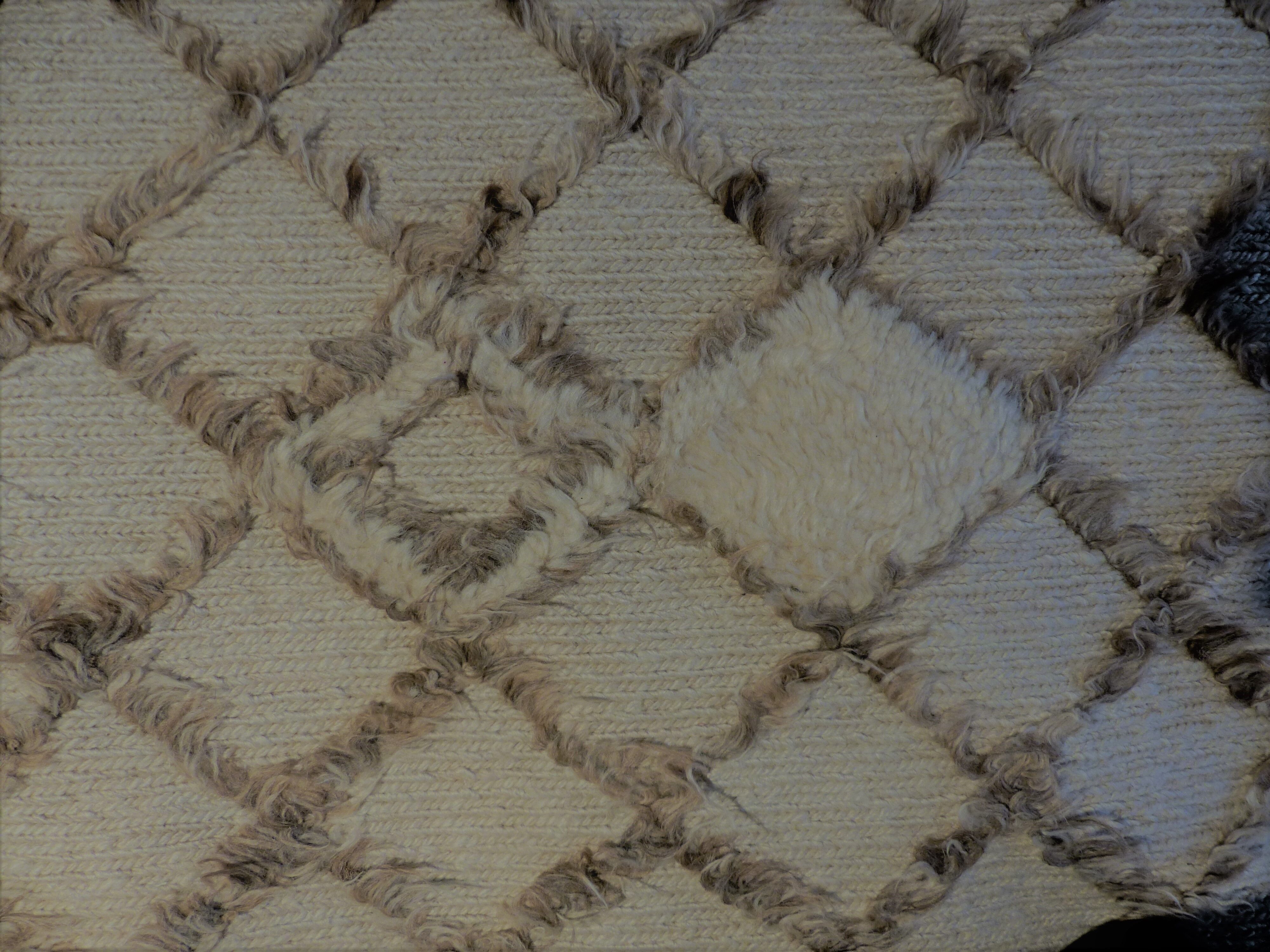 Ivory hand woven and knotted carpets