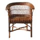 Woven rattan armchair with armrests.