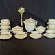 Coffee or tea service in Limoges porcelain and gold, France, Art style.