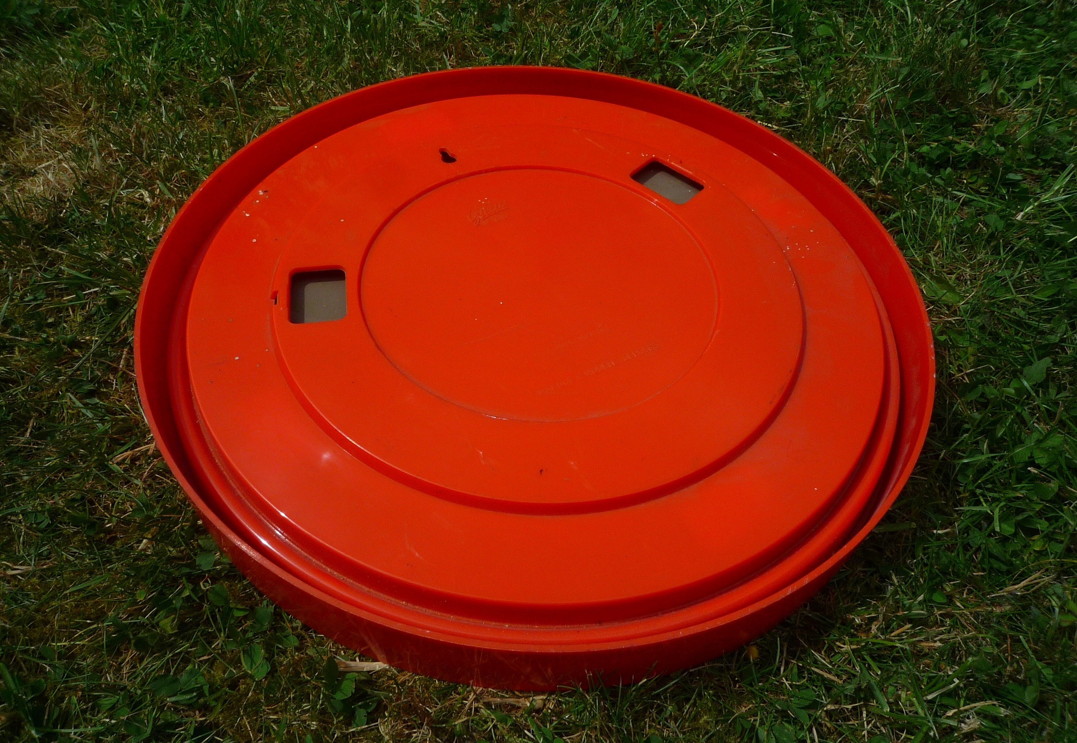 Round mirror Gilac orange vintage plastic 70s