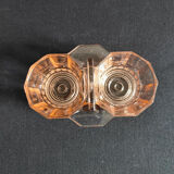 Salt shaker and pepper shaker in pink glass