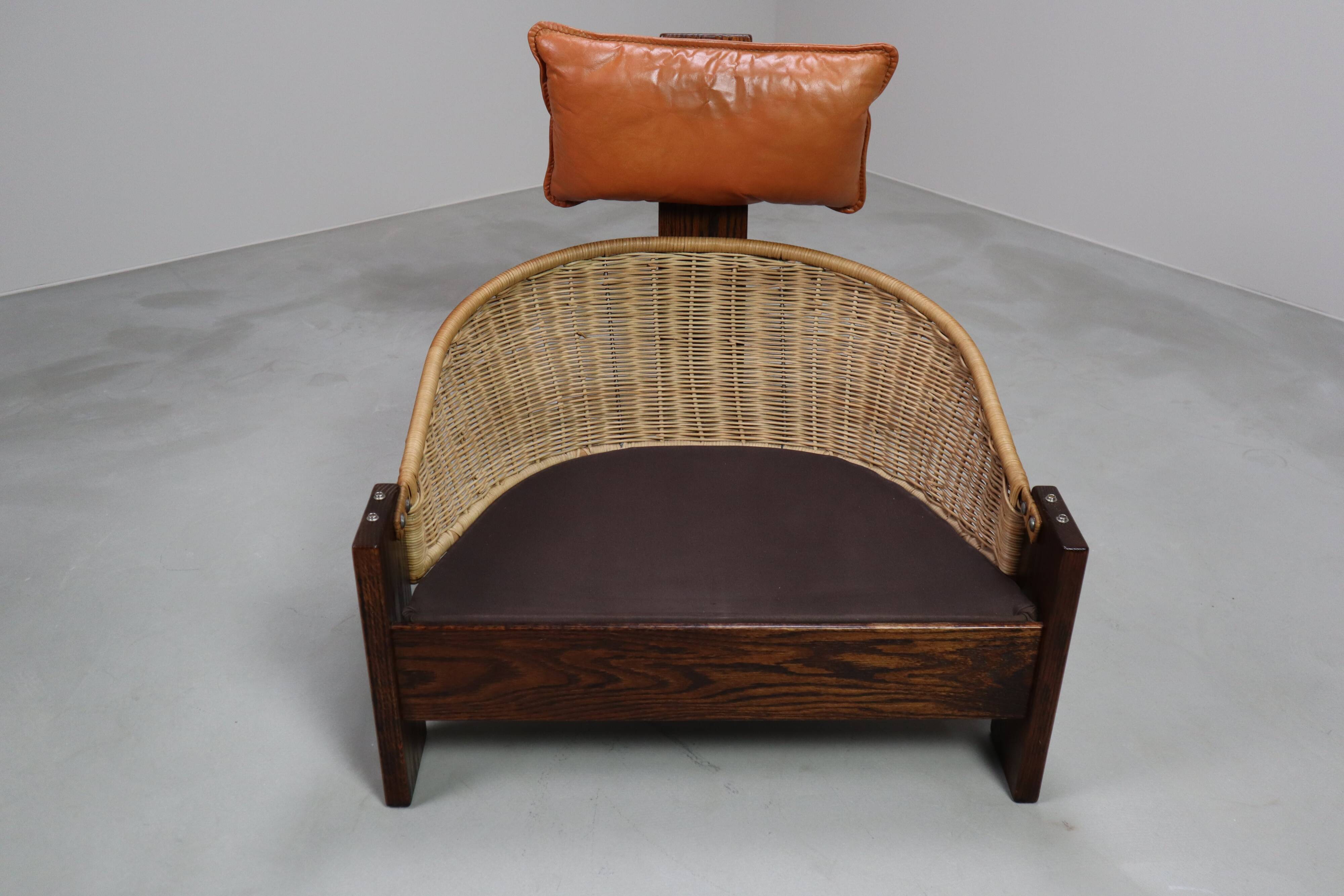Vintage tripod lounge chair in leather, rattan and oak, Netherlands