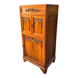 Art Deco sideboard bar cabinet in solid walnut with 3 doors and 1 richly carved tilting false drawer.