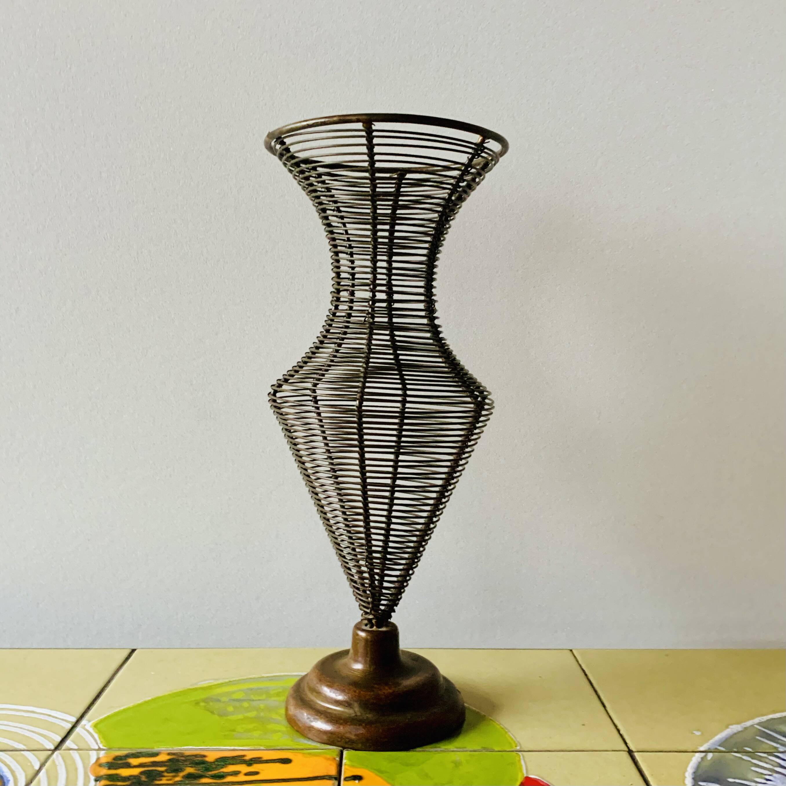 Old decorative wire vase