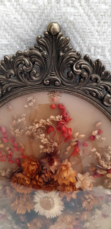 Herbier ovale vintage en laiton